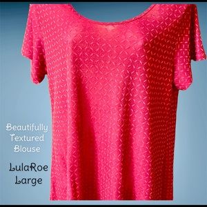 Pretty in pink LuLaRoe top